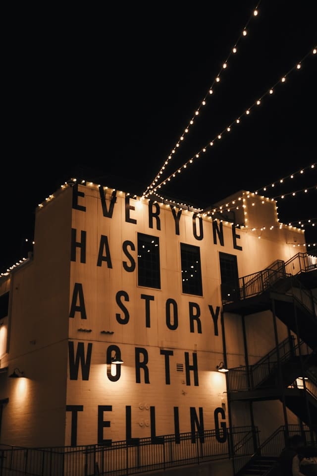 everyone has a story worth tellling written on a wall